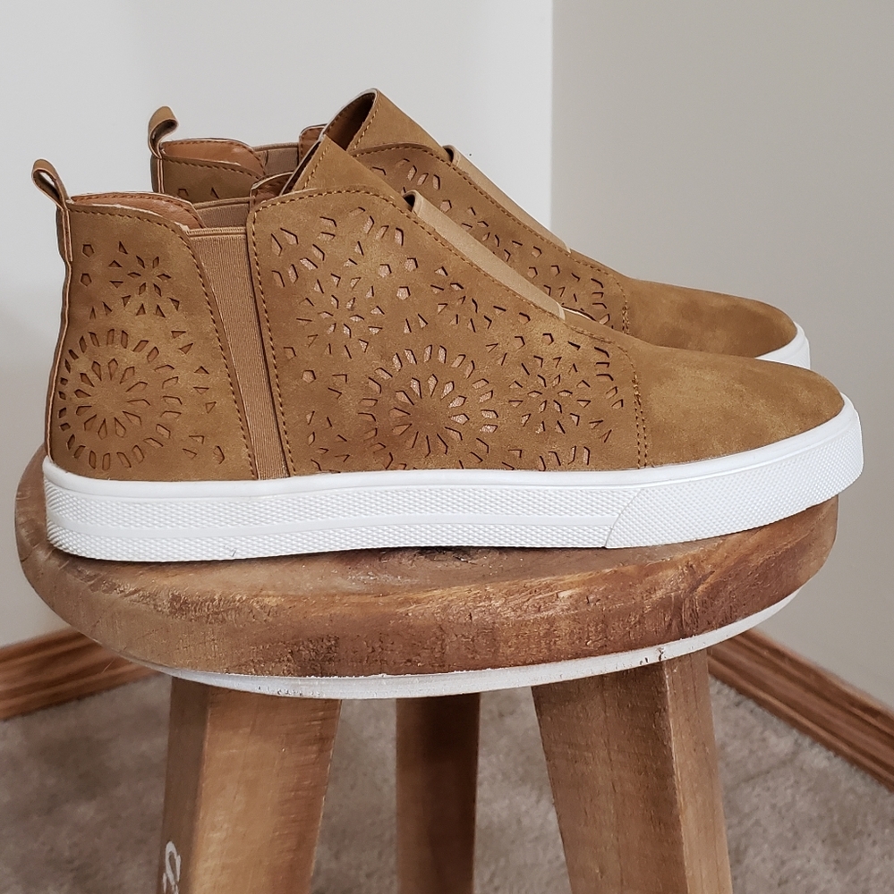 Outwoods brand ankle high slip on shoe.